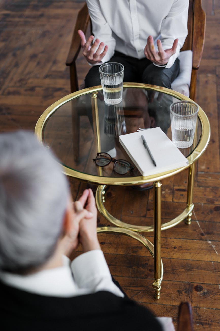 pexelsphoto4098369 The Traini Counseling Group woman in black long sleeve shirt sitting on brown wooden chair